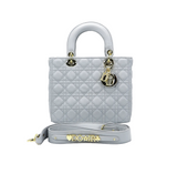 Elegant Quilted Leather Handbag with Gold Charm