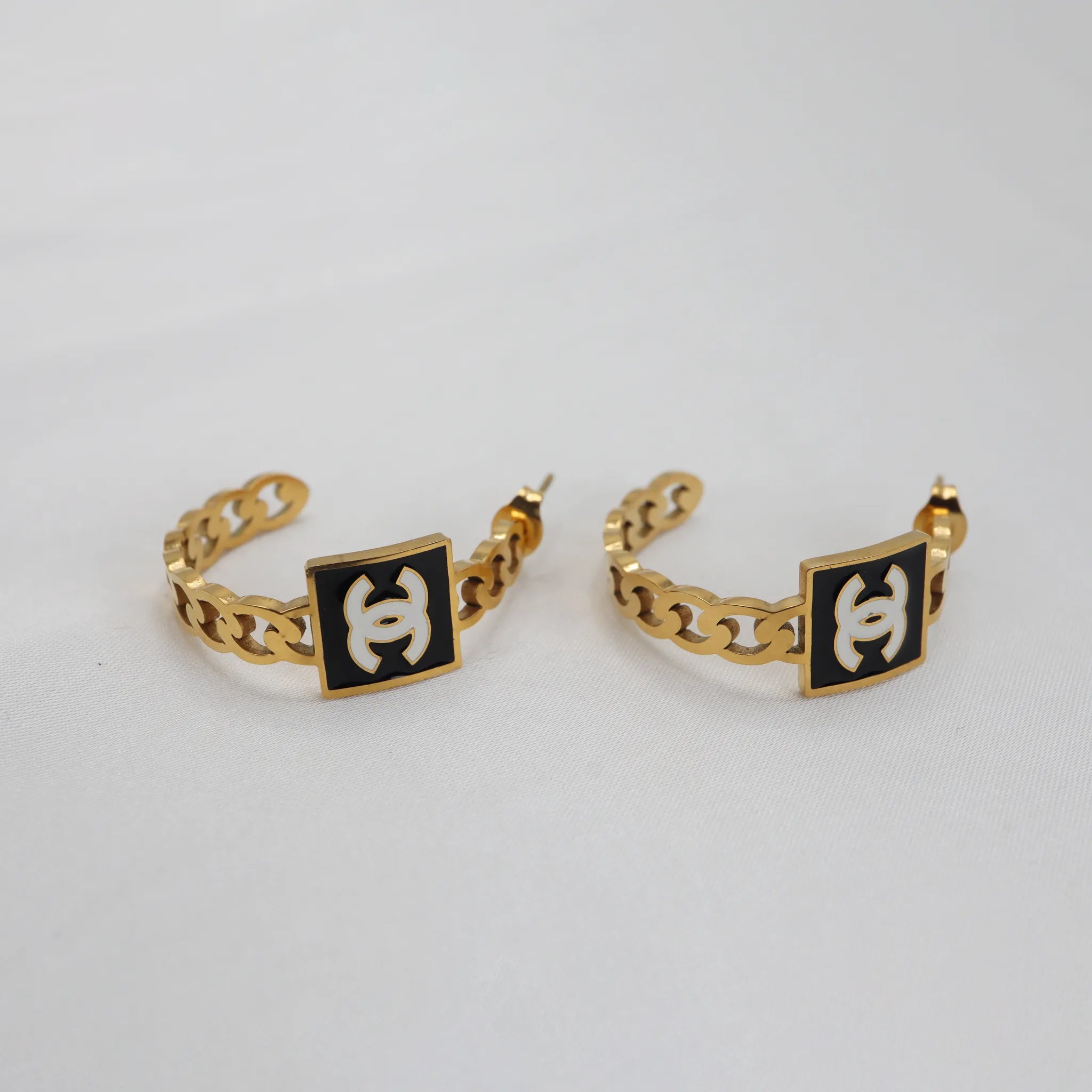 Gold Stud Earrings with Black Enamel Accent