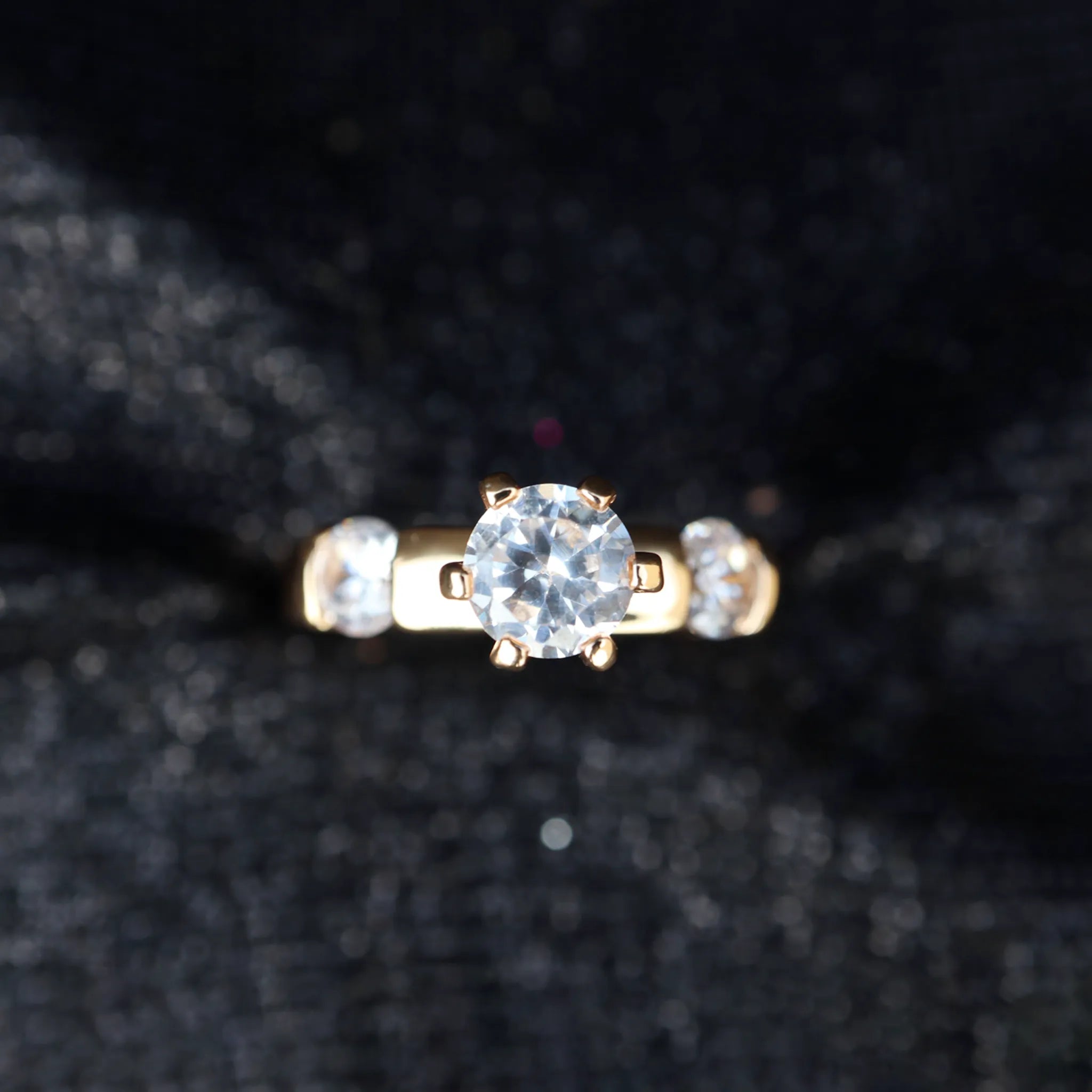 Elegant Solitaire Gold Ring with Side Accents