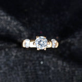 Elegant Solitaire Gold Ring with Side Accents