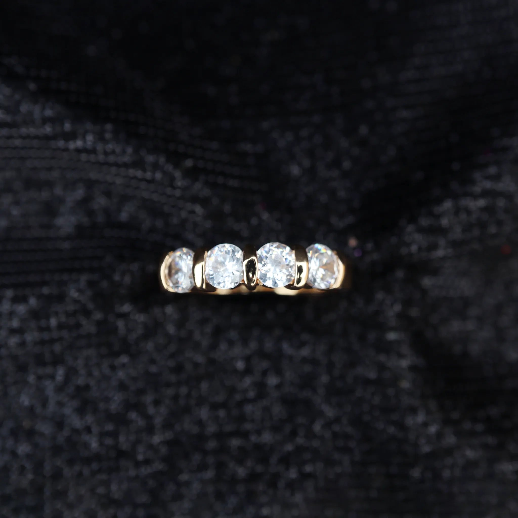 Elegant Five-Stone Gold Band Ring
