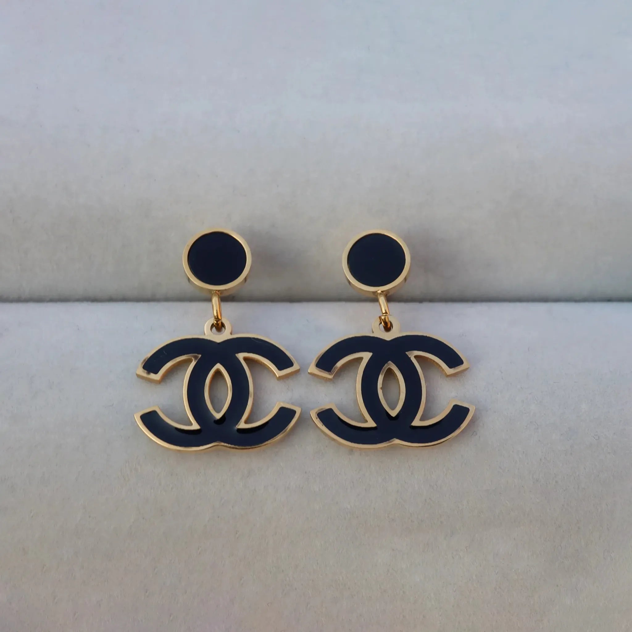 Black and Gold Double C Logo Drop Earrings