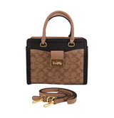 Elegant Mixed-Texture Handbag with Gold Accent