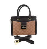 Elegant Mixed-Texture Handbag with Gold Accent