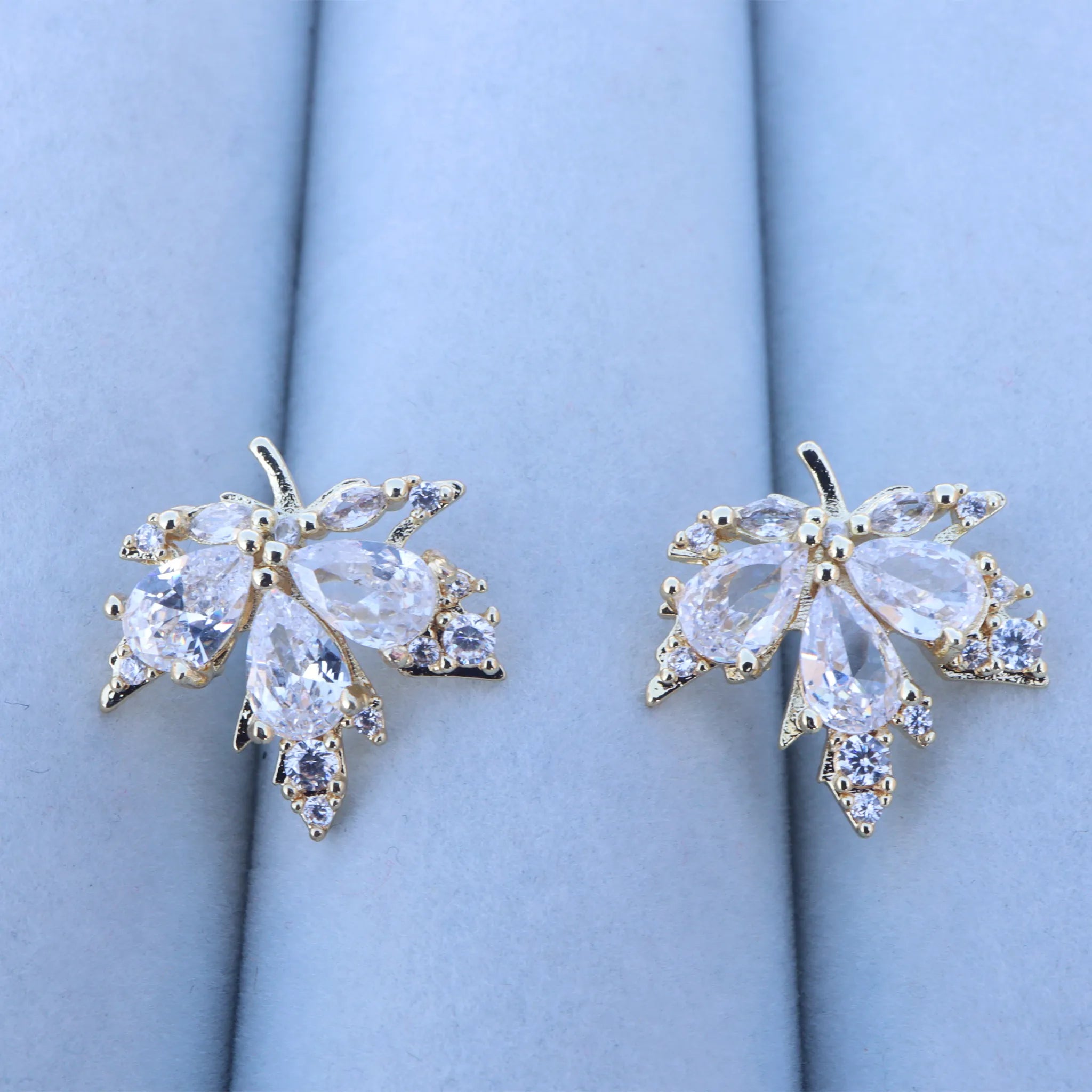 Elegant Gold and Clear Gemstone Leaf Earrings