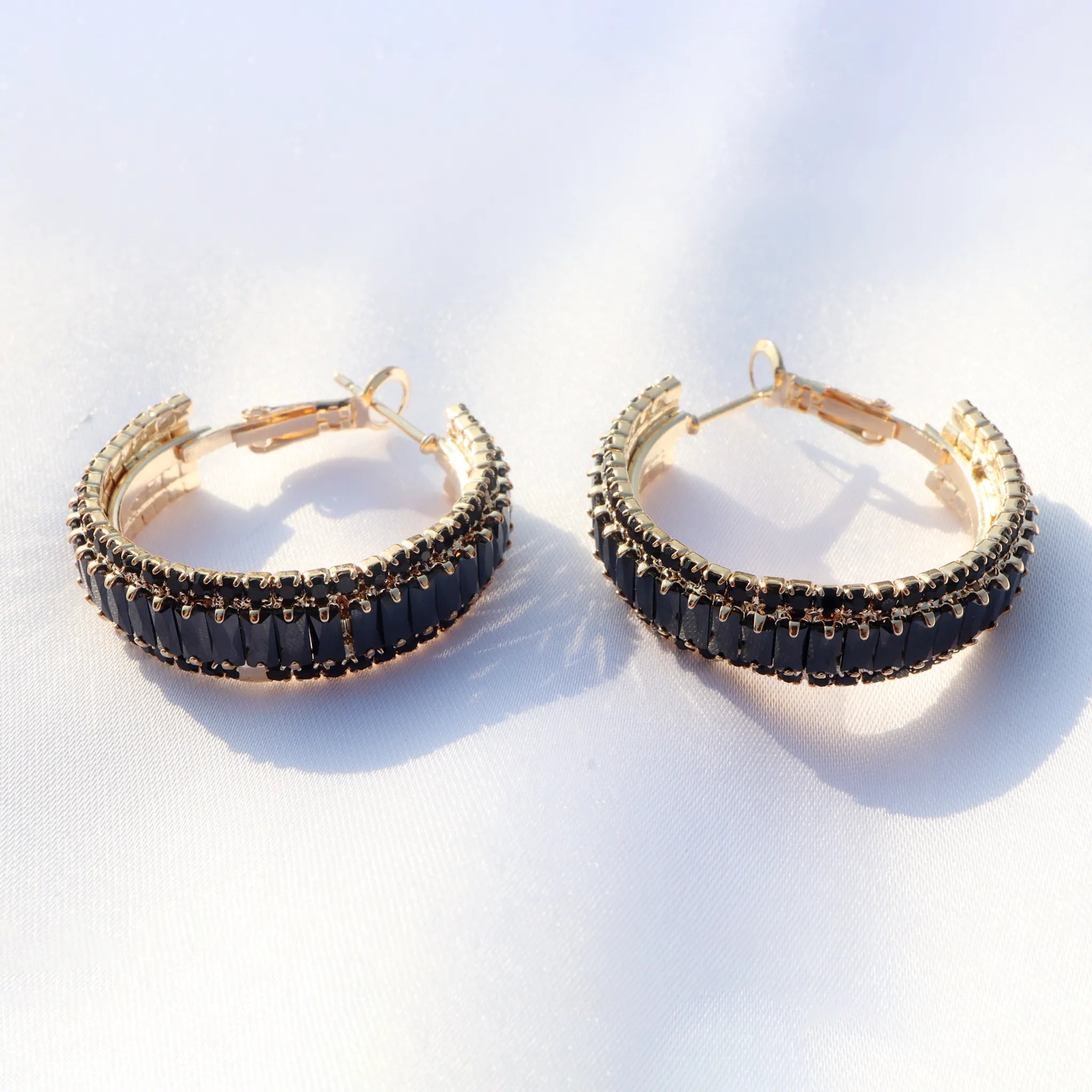 Elegant Gold Hoop Earrings with Black Rectangular Stones