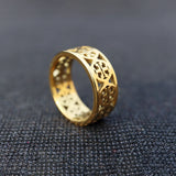 Elegant Gold Band with Intricate Detailing
