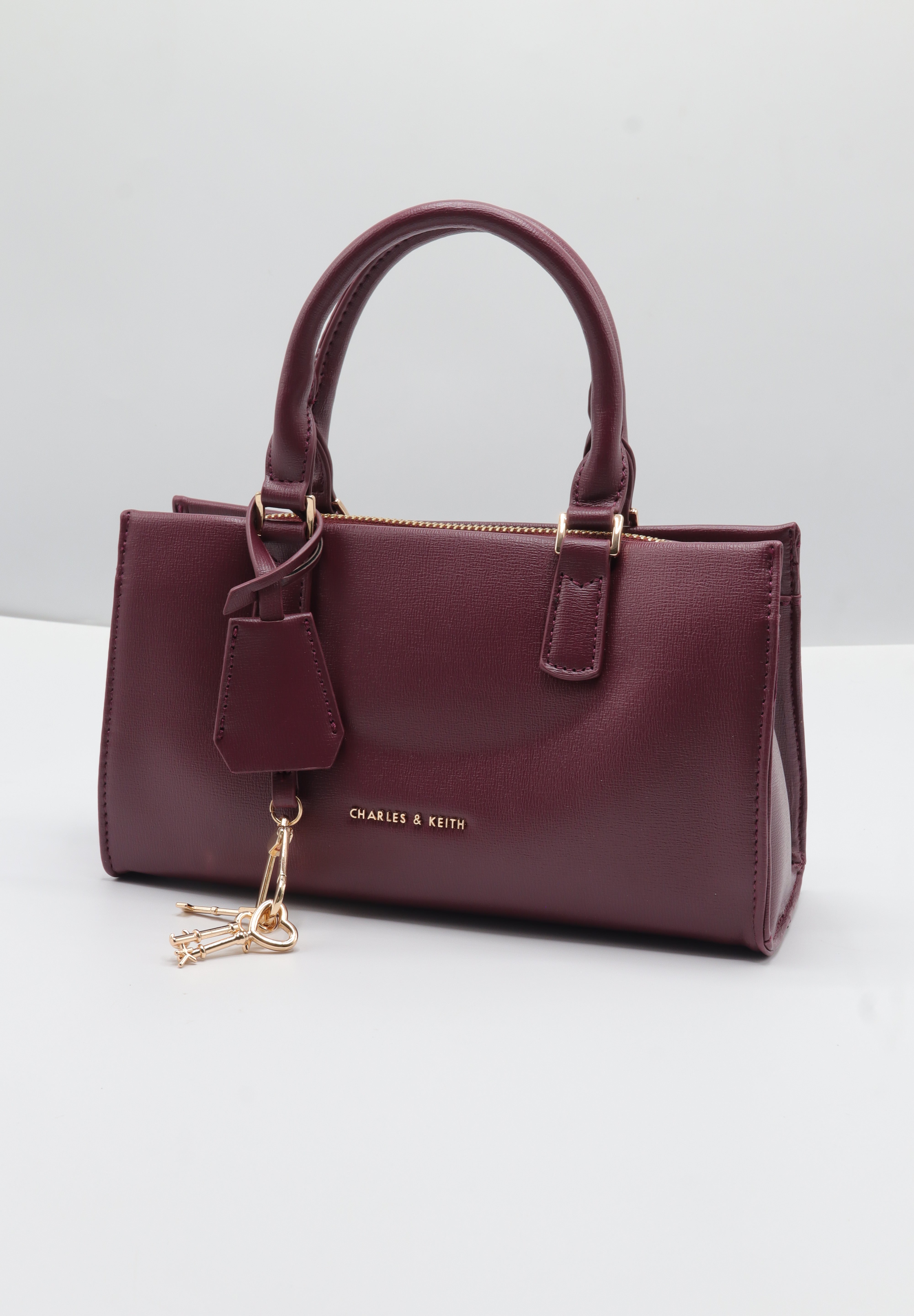 Charles & Keith City Tote | Deep Burgundy & Gold