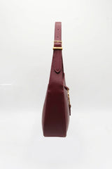 Saint Laurent LE 5 À 7 Leather Shoulder Bag | Burgundy & Gold