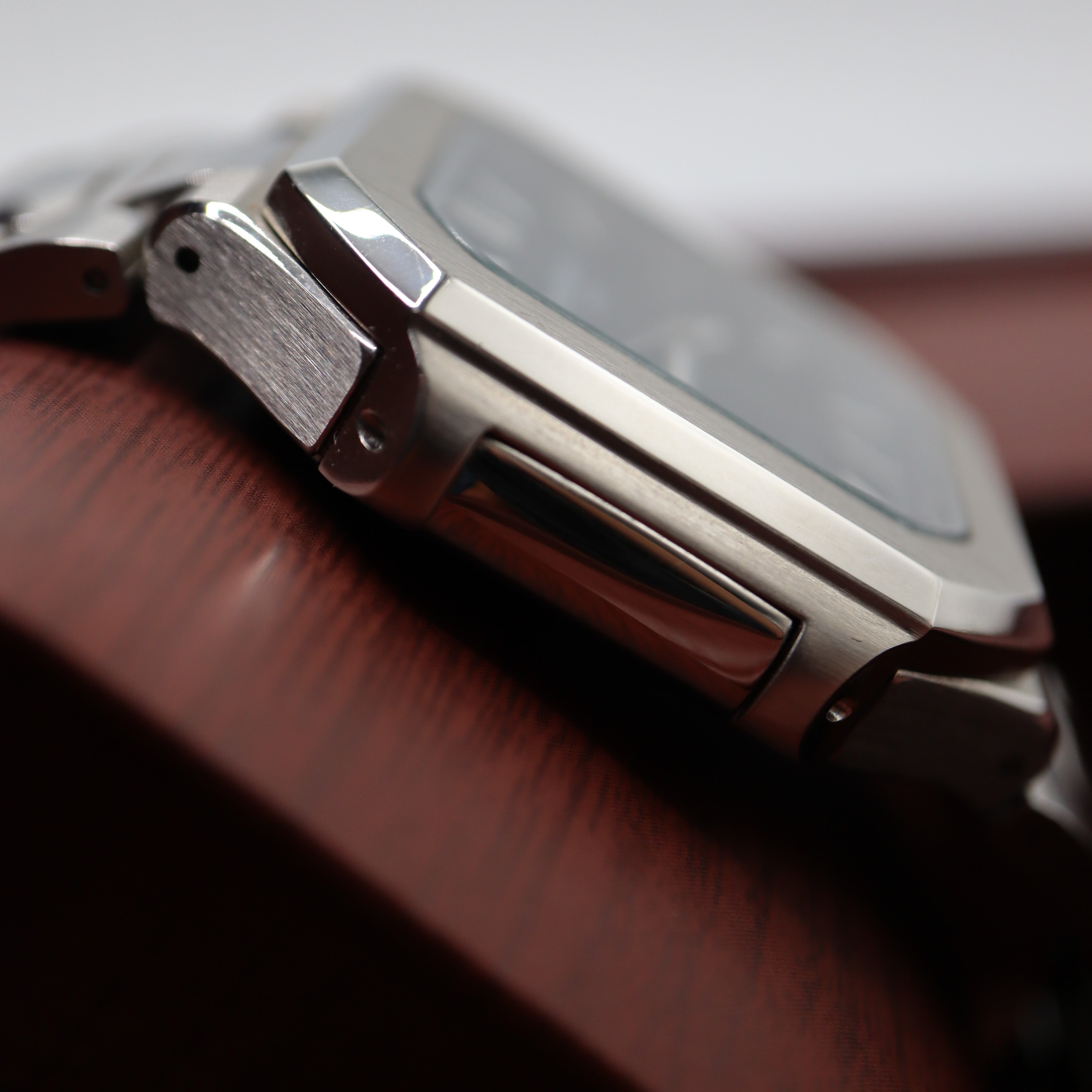 Patek Philippe Style Nautilus / Cubitus Watch – Men's Steel & Black Striped Dial Watch