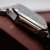 Patek Philippe Style Nautilus / Cubitus Watch – Men's Steel & Black Striped Dial Watch