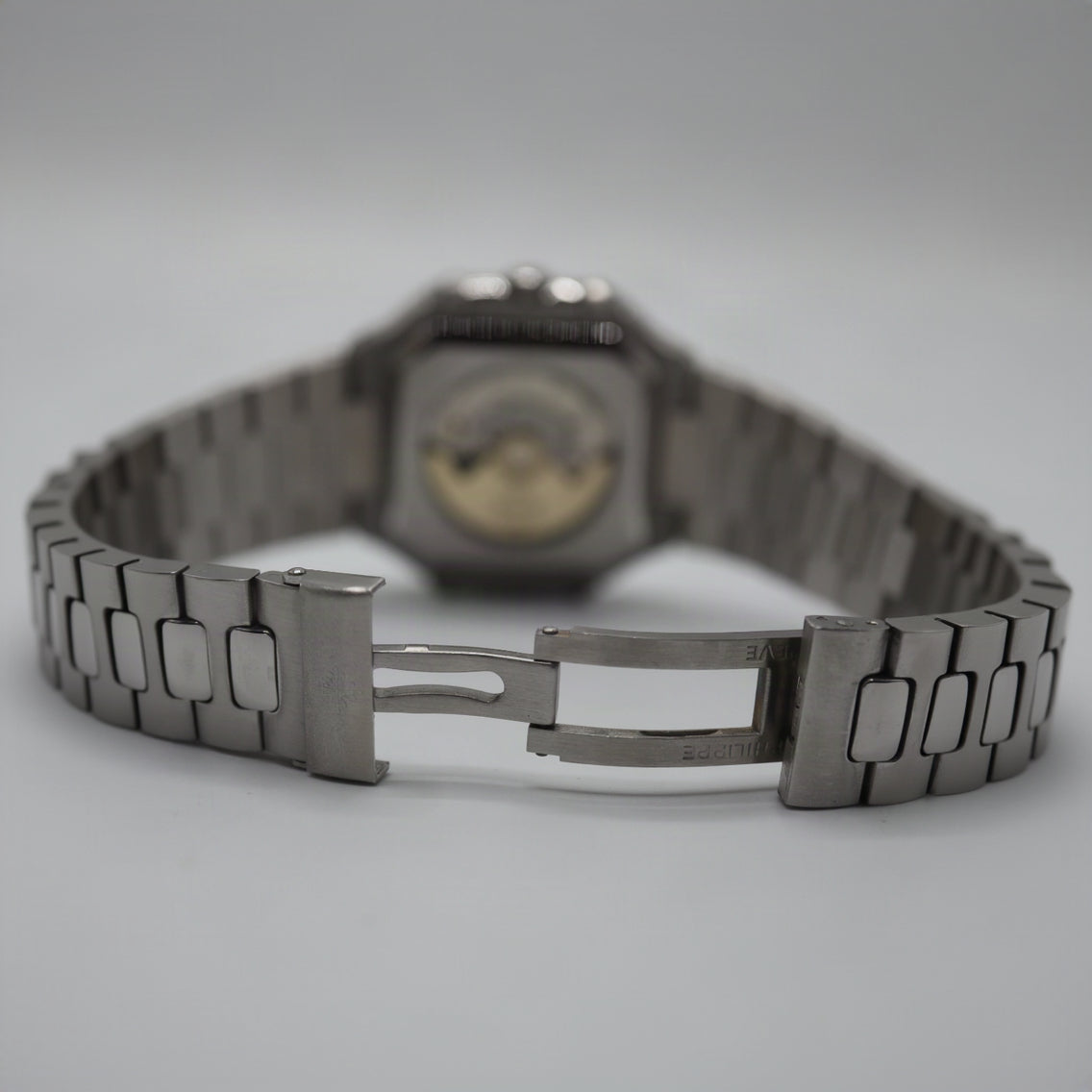 Patek Philippe Style Nautilus / Cubitus Watch – Men's Steel & Black Striped Dial Watch
