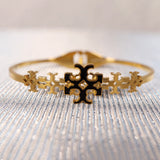 Tory Burch floral Gold Bangle for girls