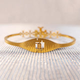 Tory Burch floral Gold Bangle for sale(1)