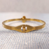 beautiful gold ring with black stone