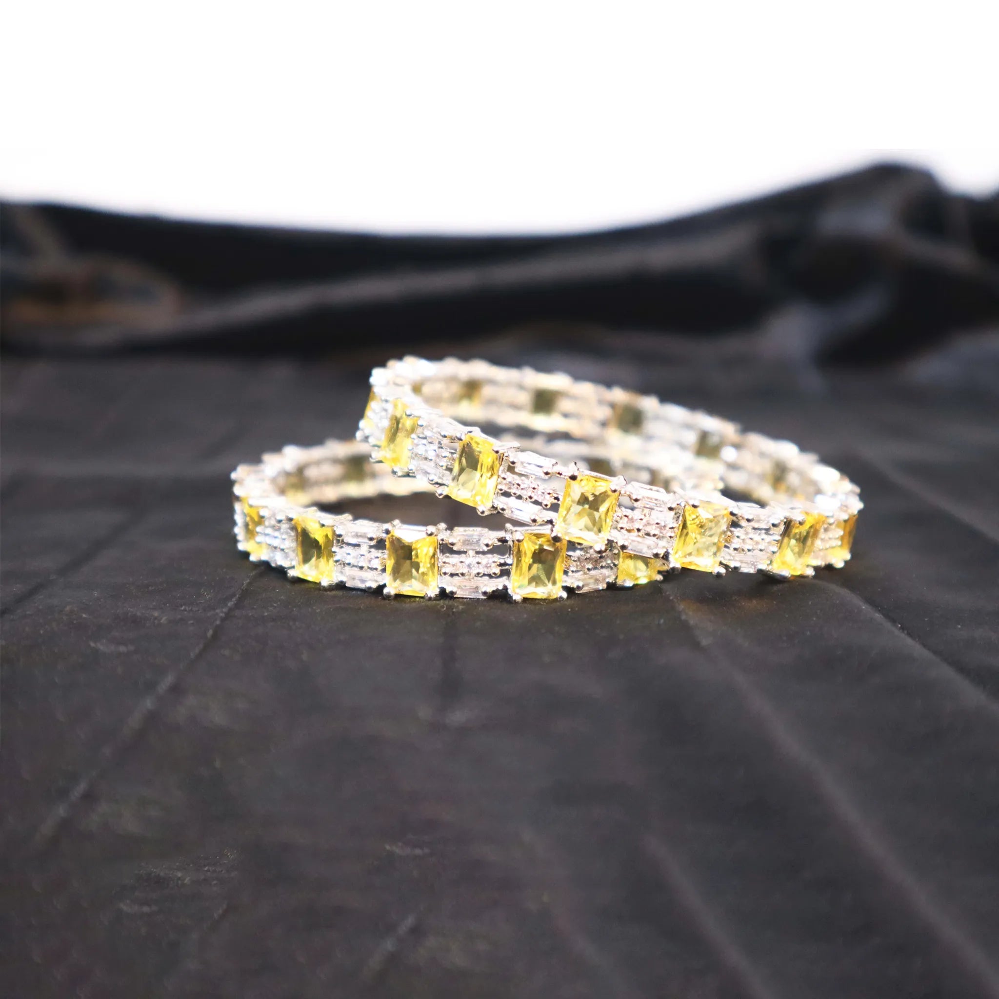 silver bangles with lime stonnes