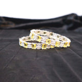 silver bangles with lime stonnes