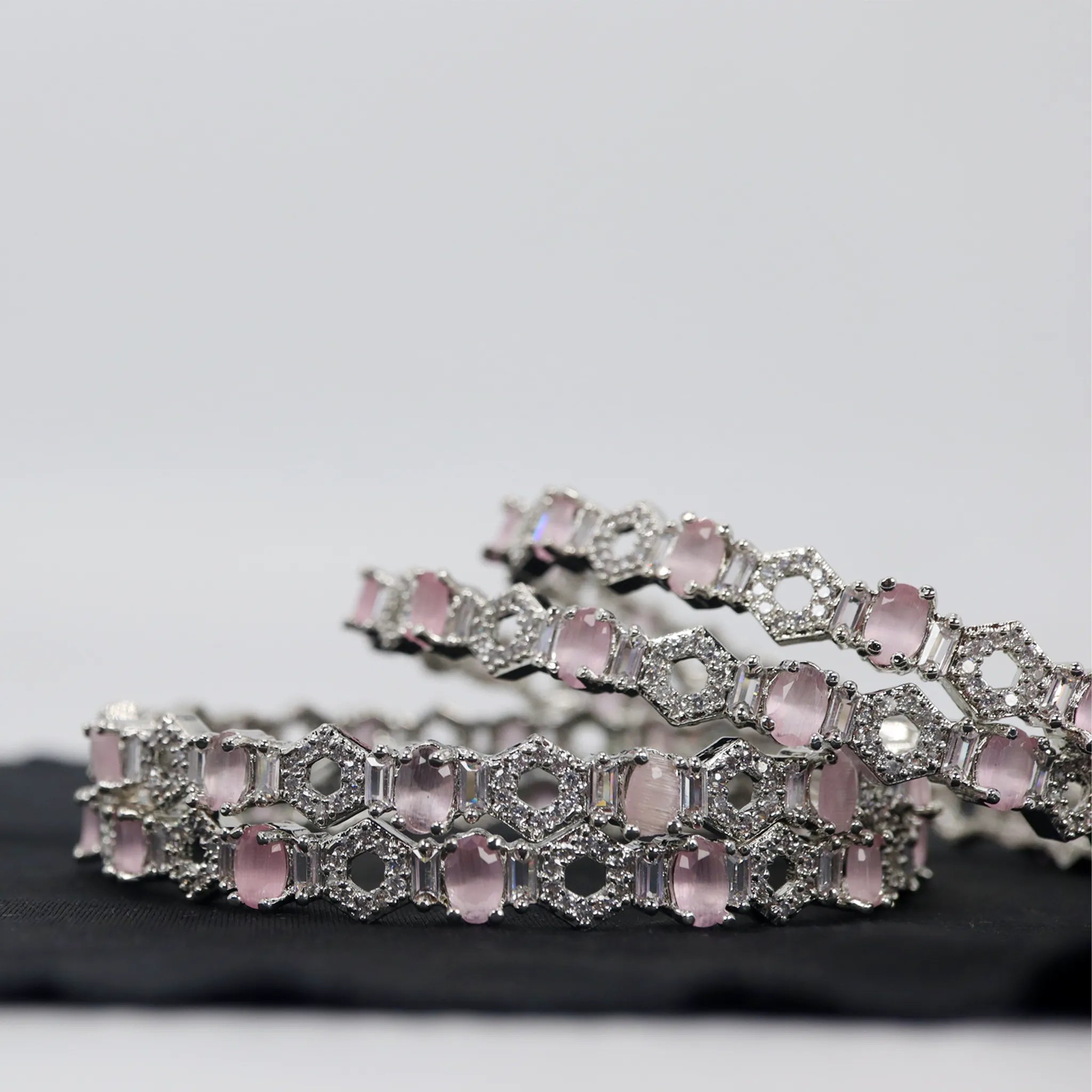 unique design bangles with pink stones