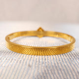 versache gold bracelets