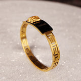 versache rings with logo