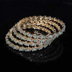 stylish bangles design with sea green stones