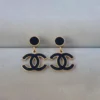 Black and Gold Double C Logo Drop Earrings