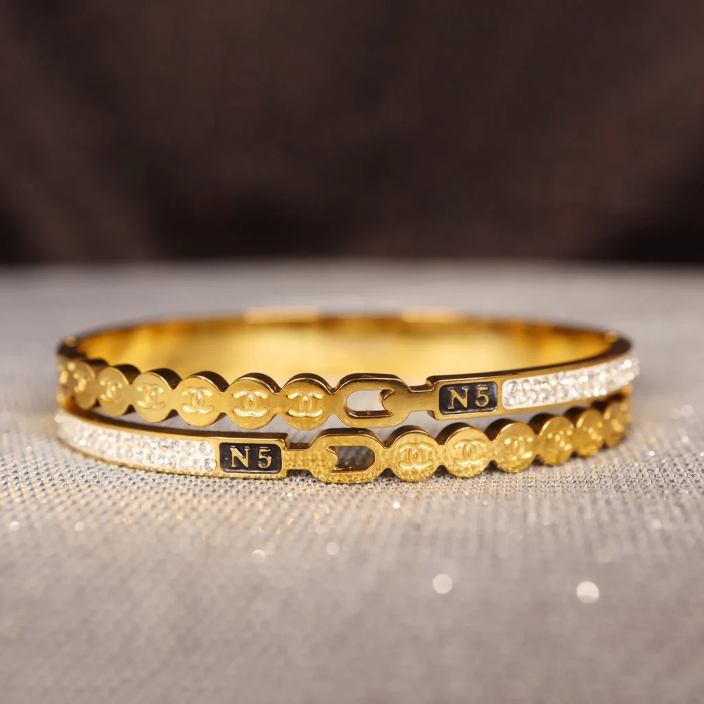 channel minimalist gold bangles for sale